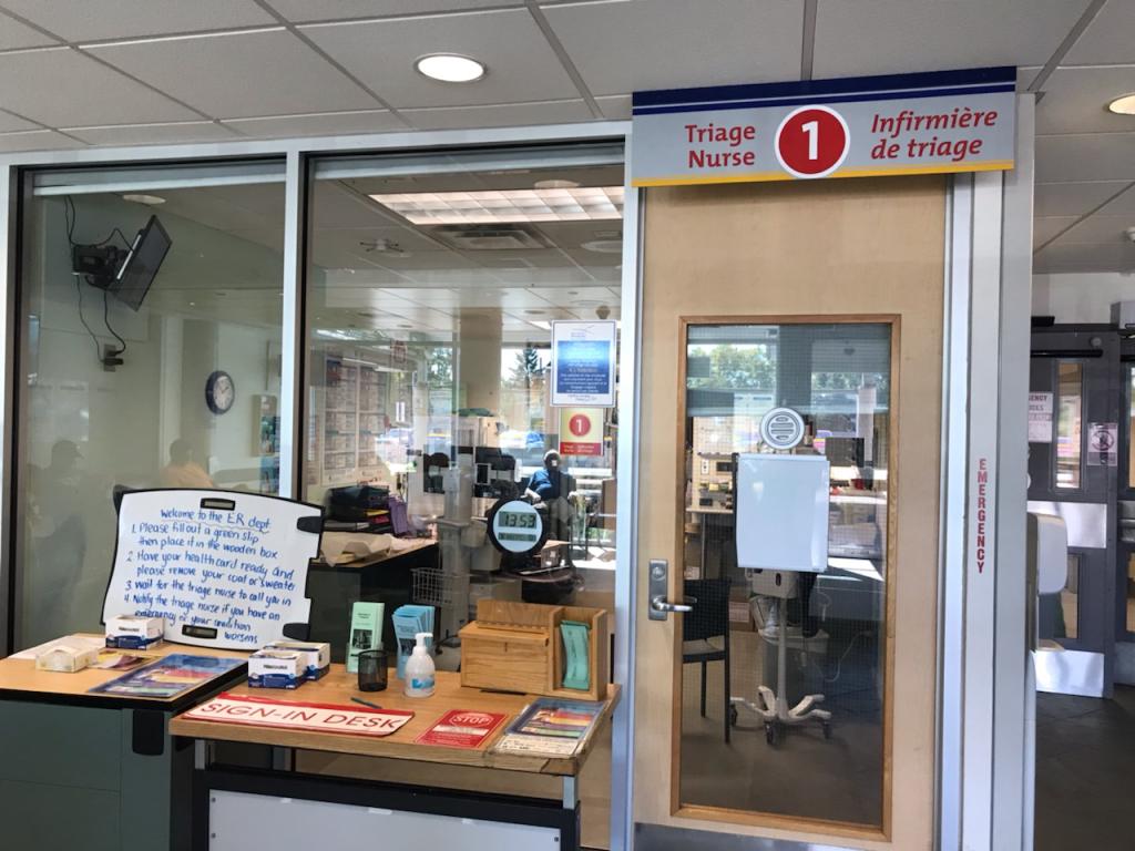 picture of office with desk in front of the window. 